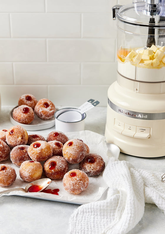 Lemon scented strawberry jam doughnuts