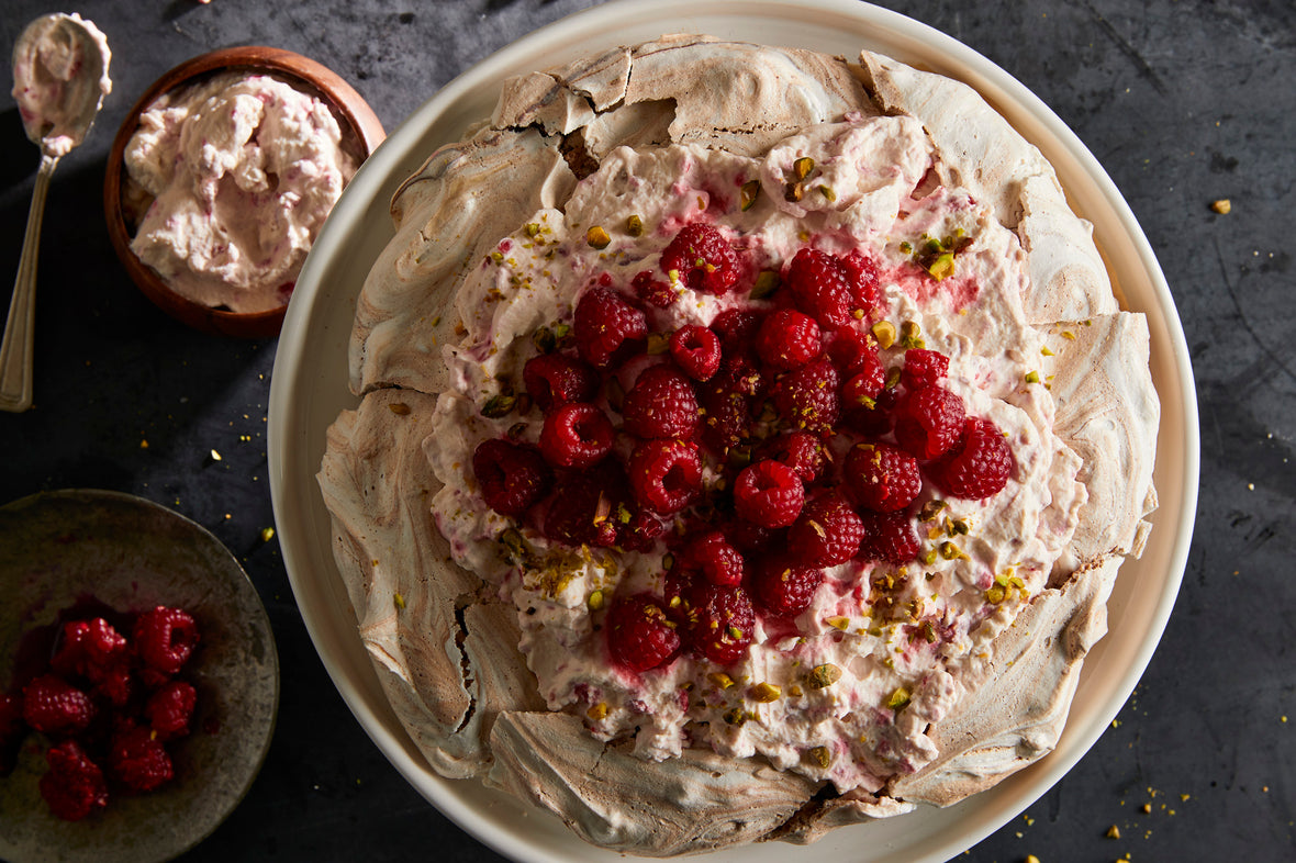 Chocolate Pistachio Pavlova with Raspberry Cream