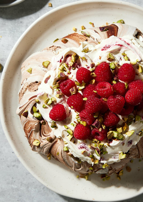 Chocolate and pistachio pavlova