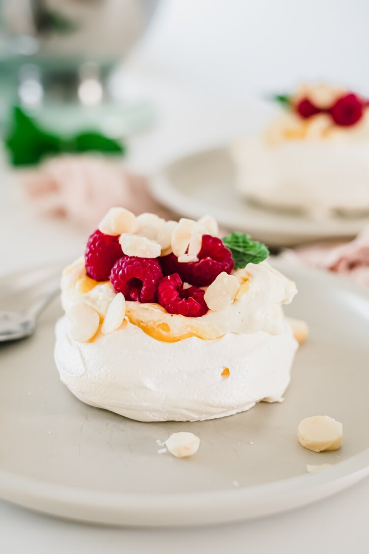 Vanilla bean and mango pavlova with macadamia | Melanie Lionello